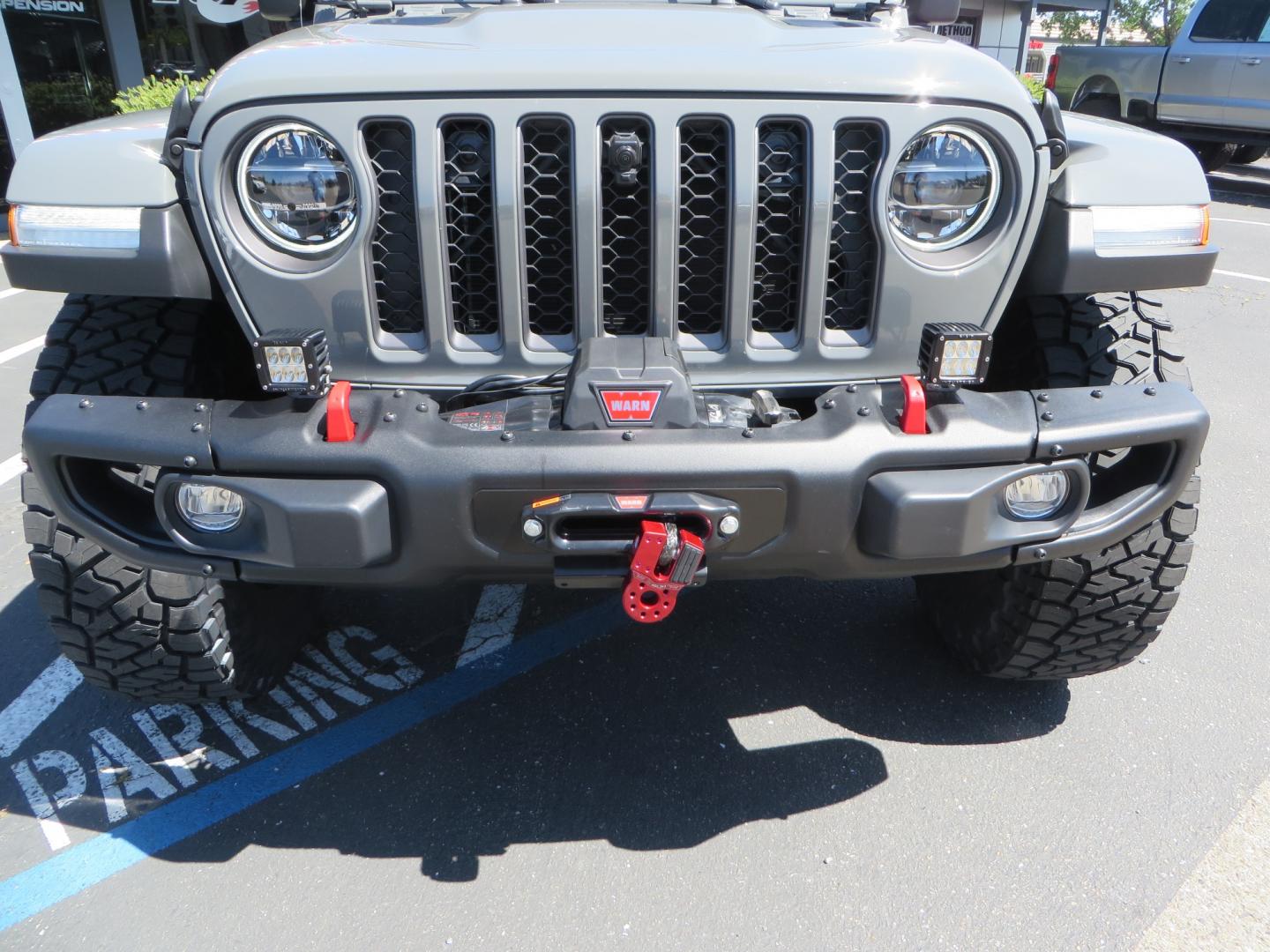 2021 Sting Grey /BLACK Jeep Wrangler Unlimited Rubicon (1C4JJXFM5MW) with an 3.0L V6 DOHC 24V TURBO DIESEL engine, 6A transmission, located at 2630 Grass Valley Highway, Auburn, CA, 95603, (530) 508-5100, 38.937893, -121.095482 - Diesel JL with Sky One power top featuring a Teraflex suspension system, Falcon adjustable shocks & steering stabilizer, Full Metal Cloak skid plate, 17" Method bead grip wheels, 37" Toyo RT Trail tires, Warn winch, Rigid Led lighting, Teraflex HD spare tire carrier, Teraflex Diff covers, Amp steps, - Photo#12